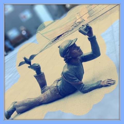 бронзовый фотограф