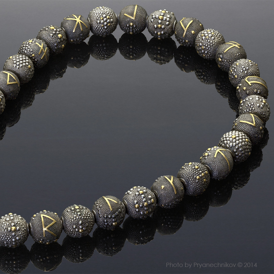 Рекламное фото ювелирных изделий. Славянские руны